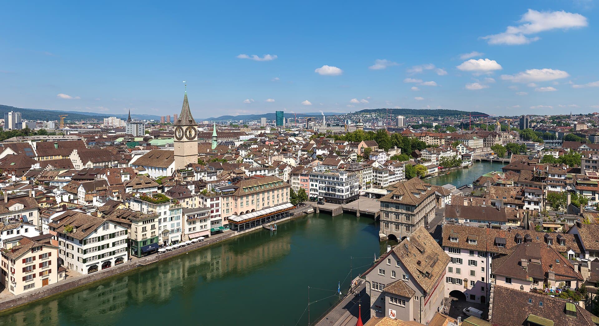 Zurich skyline with lake and mountains